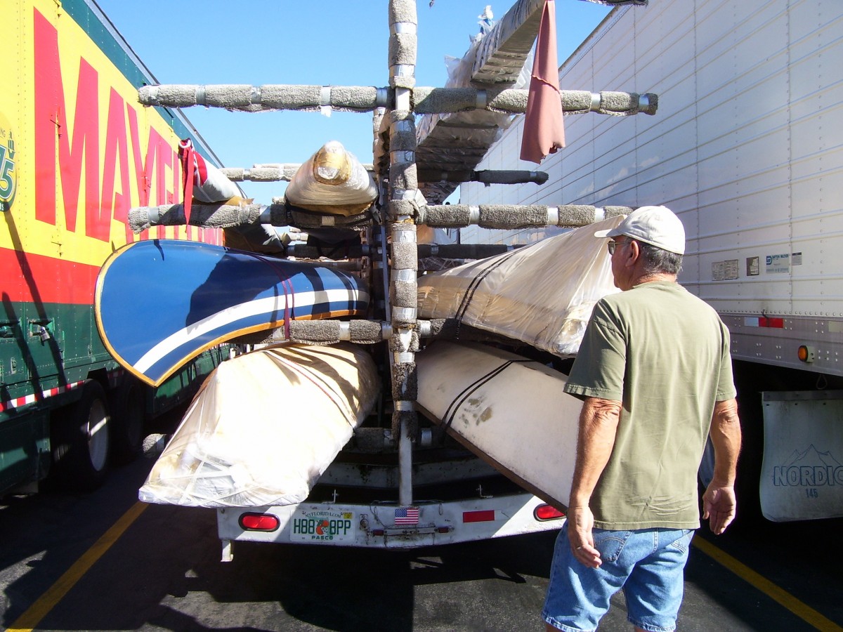 Checking out the load of canoes