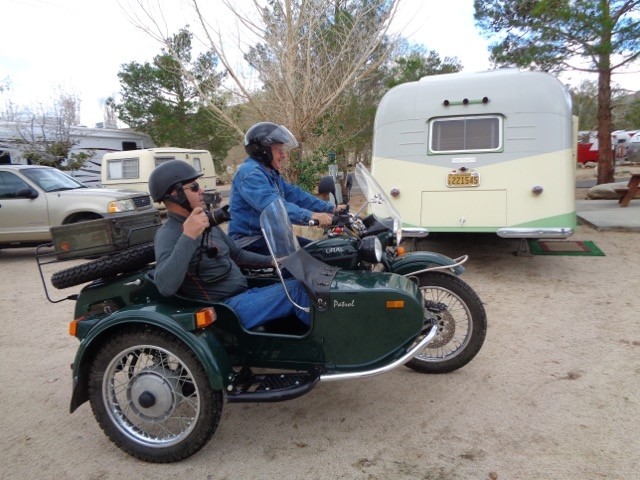 Chuck takes Steve for a ride in the Ural Sidecar