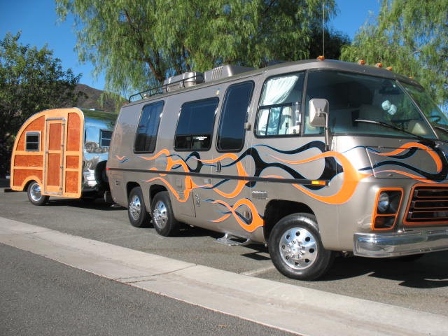 
1977 GMC 
[1956 Woodie
Love Bug tow vehicle]
Dayton &amp; Pam Taylor
Temecula, California 