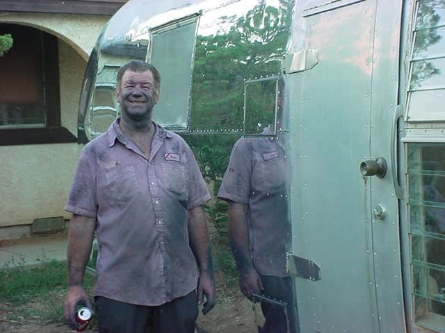 "Polishing . . . Ain't Polishing Fun?"
"Is it an Airstream?"
(Can you believe
he's still smiling) . . .
Bob Ross