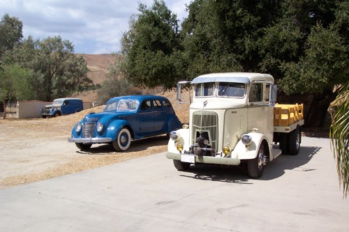 (l. to r.)
'41 Chevy panel truck
'37 Chrysler Airflow
'38 REO