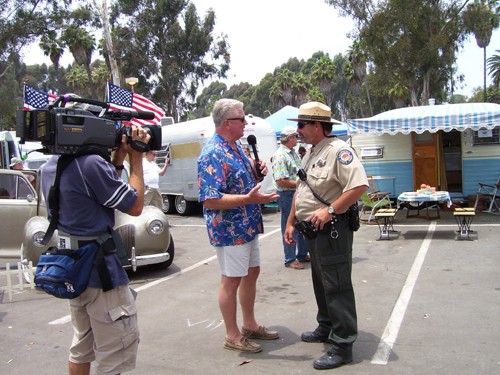 
Huell Howser interviewing ranger. 