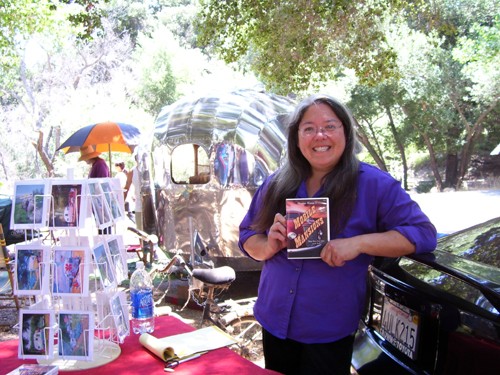 
Lisa Archer in front of The Mystery Trailer; presented "Mobile Mansions" DVD Saturday evening. 