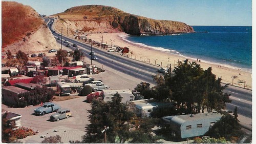 c.
PM 1957
"Devil's Postpile" Trailering
U.S.Highway 101 (alt.) between Newport Harbor and Laguna Beach
(Mirro-Krome Card by Crocker Co., Inc., Calif.; Geo. E. Watson, Photographer)