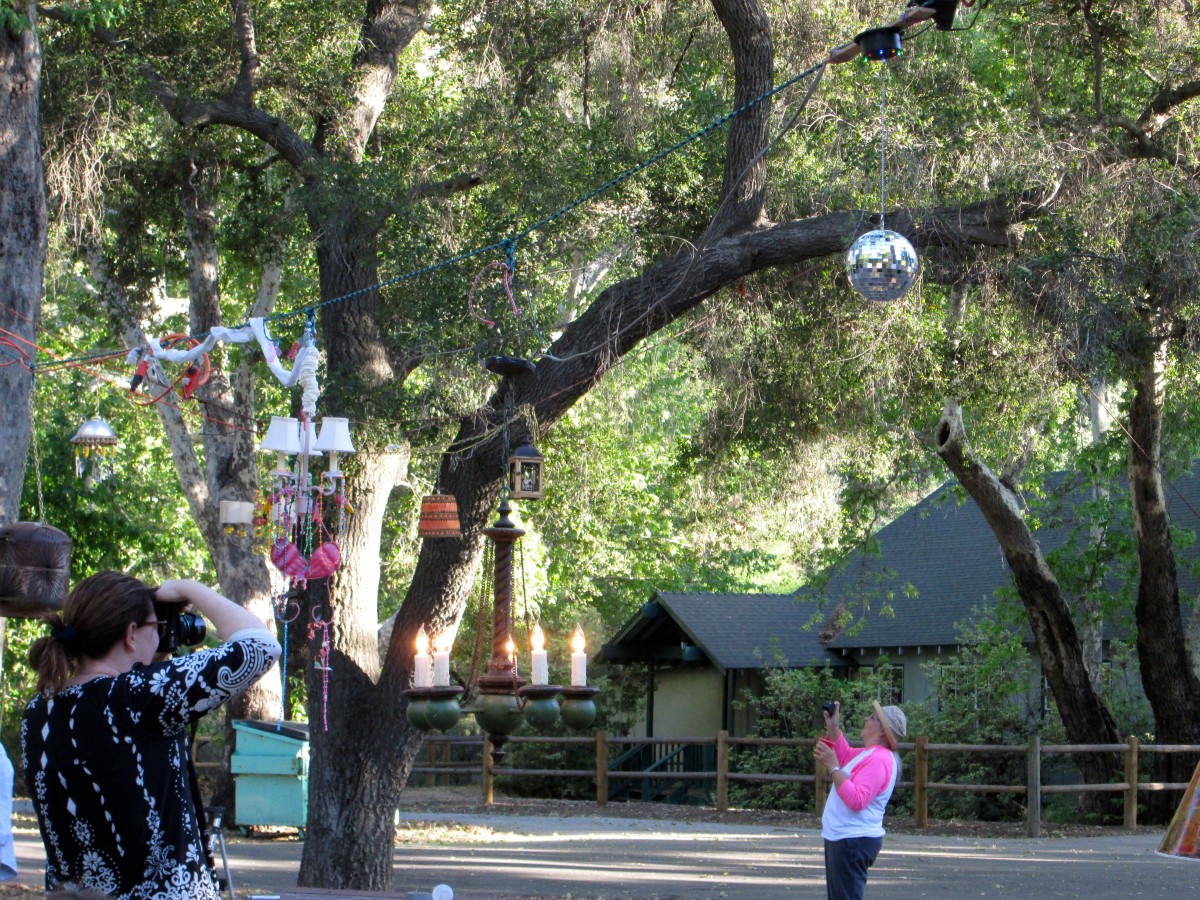 Admiring the completed "hanging of the chandeliers"