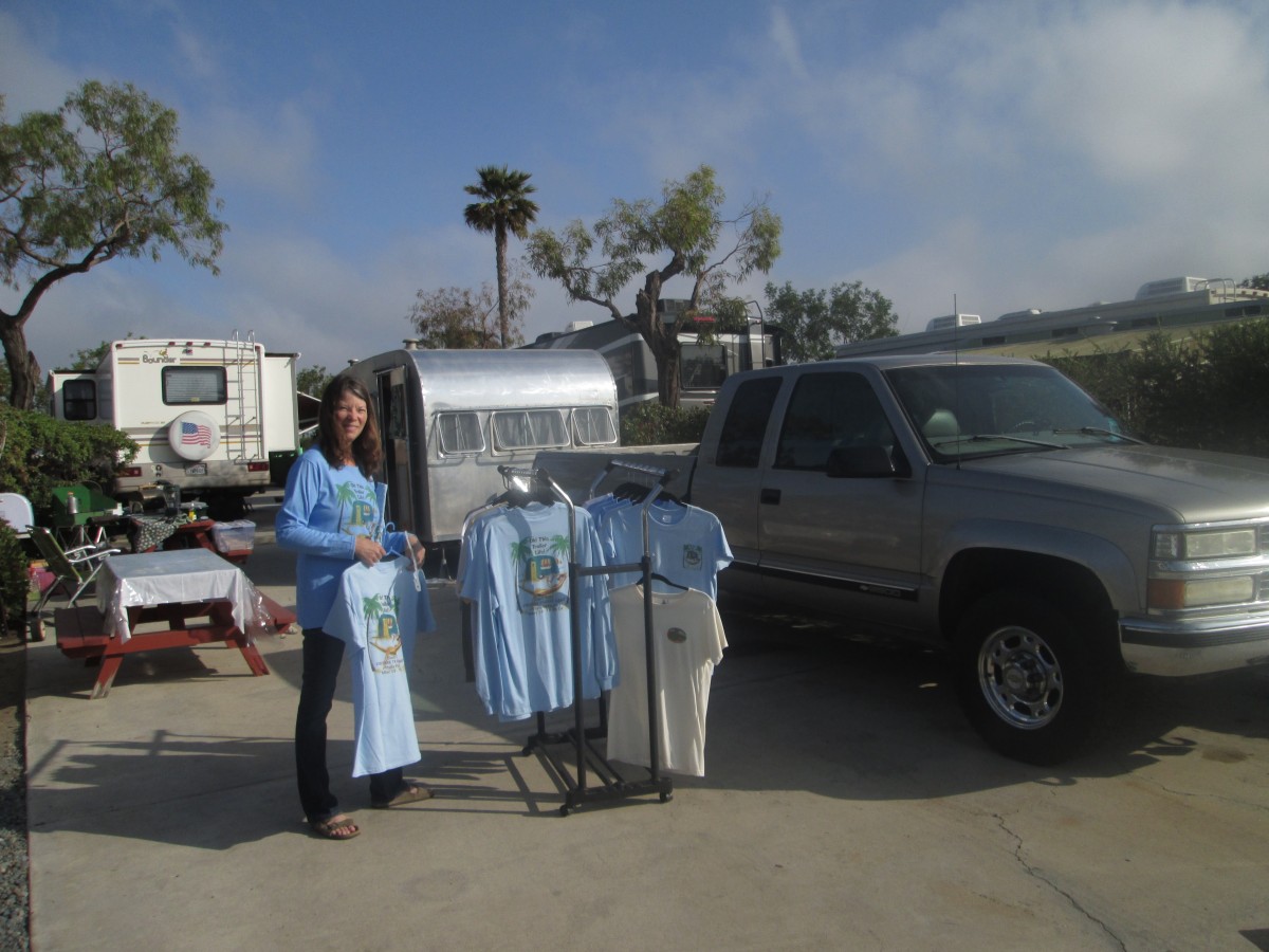 Ellen working hard
organizing the
shirt orders